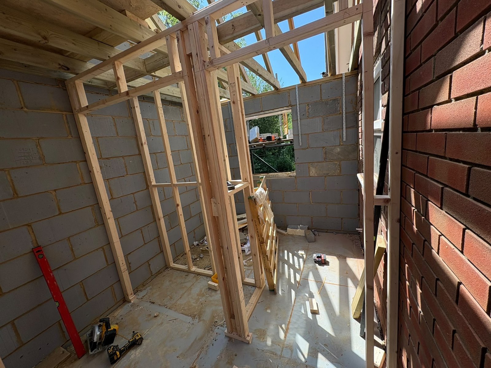 Timber wall framing within a building project