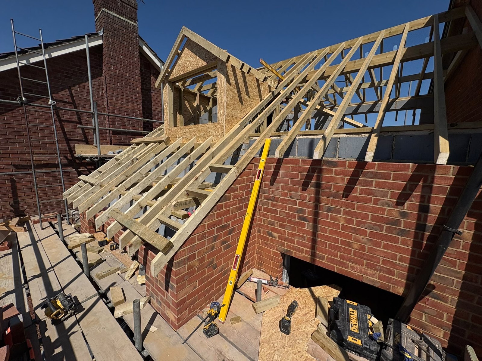 Timber roof framework on a brick building
