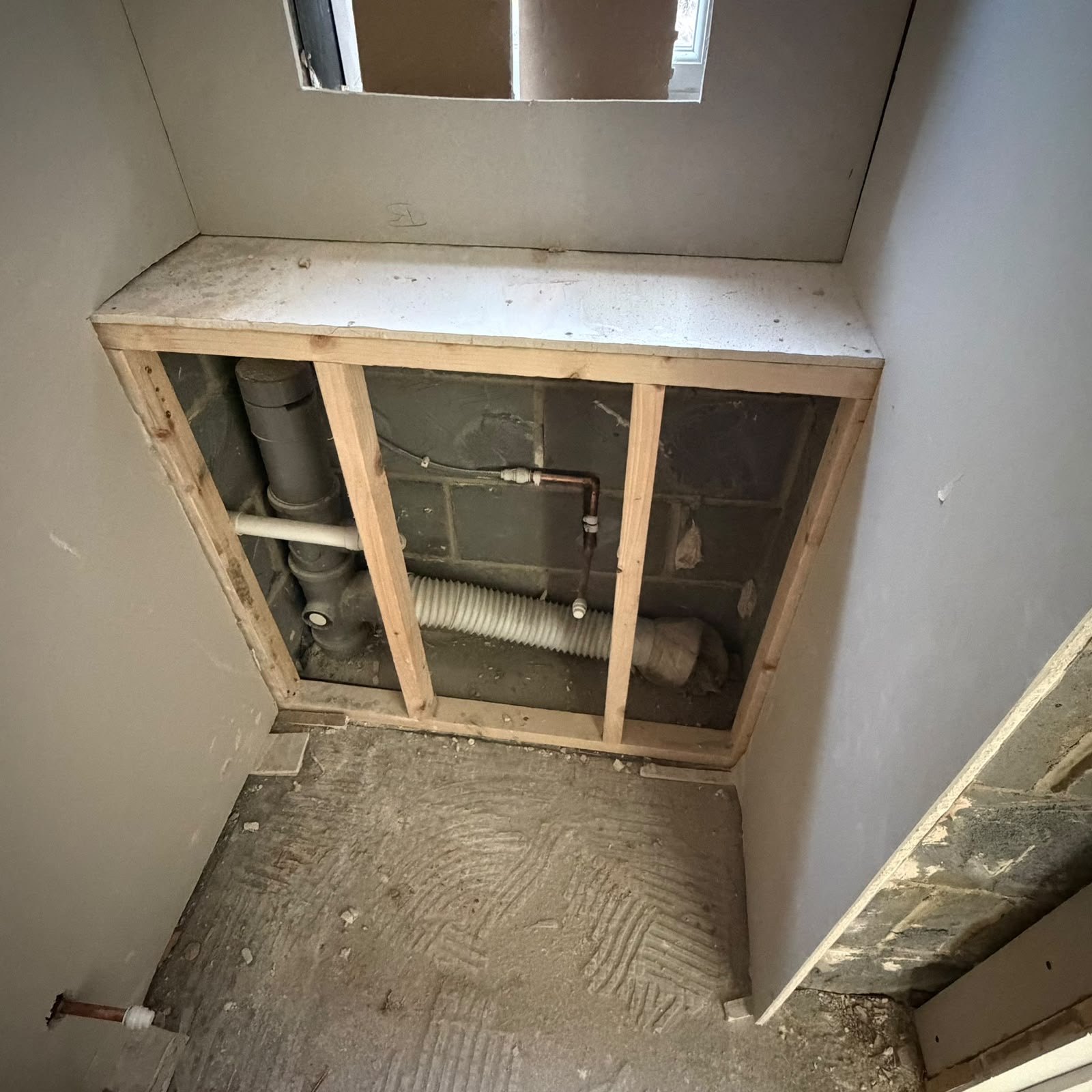 Timber framing fitted beneath a sloping ceiling